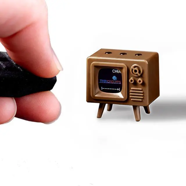 Main image of TinyTV® Mini Ultra-Mini Classic TV, Preloaded & Uploadable Videos, USB-C Rechargeable, 0.6 OLED Display (Brown)