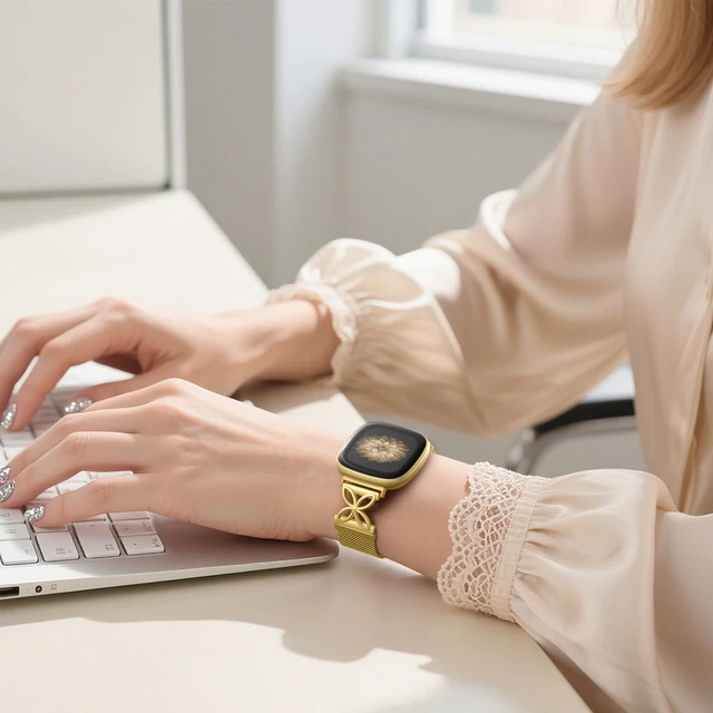 Alt view image 6 of 7 - Metal Band Compatible with Fitbit Versa 4 Bands for Women/Fitbit Sense 2 Bands for Women, Floral Shape Stainless Steel Mesh Loop Strap Replacement for Fitbit Versa 4/Versa 3/Sense Smartwatch, Gold
