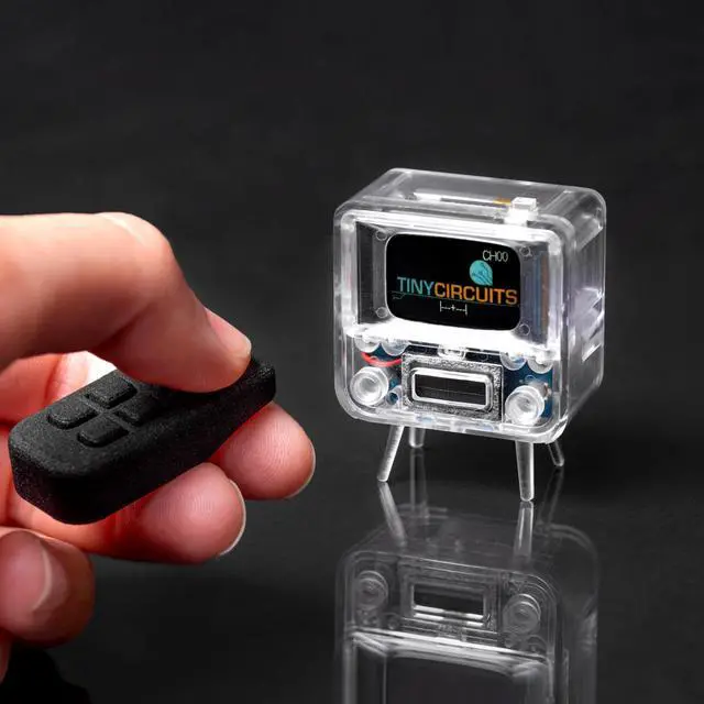 Alt view image 4 of 6 - TinyTV 2 Portable Retro Mini TV 1.14 IPS Screen, Preloaded & Uploadable Videos, USB-C Rechargeable, Knob Controls + Tiny Remote (Clear) | 1.14" IPS Screen, Preloaded & Uploadable Videos, USB-C Rech