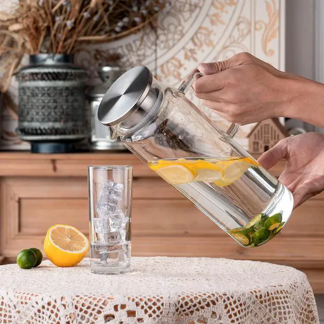 Alt view image 6 of 7 - Set of 2 Glass Pitcher with Lid,2 Quart (64 oz / 1.9 Liter) Leak Proof,Glass Water Jugs, BPA-Free,Microwave & Dishwasher Safe Pitcher,Sun & Iced Tea, Sangria,Cold Brew Coffee & More