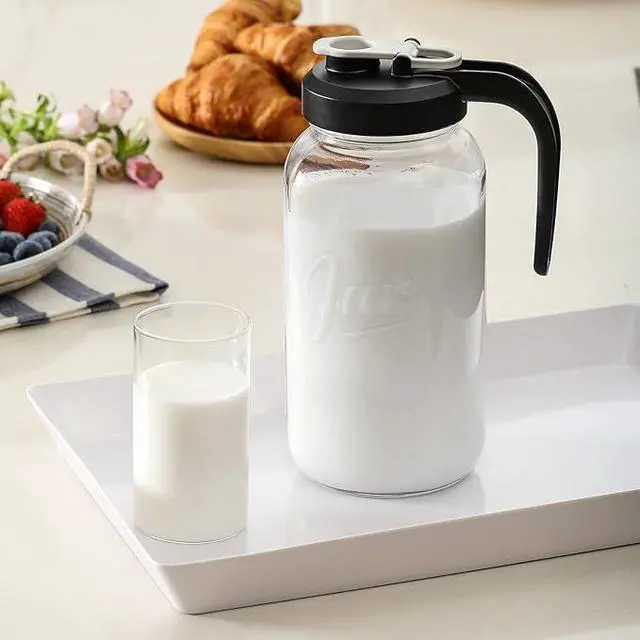 Alt view image 5 of 6 - Set of 2, Glass Pitcher with Lid - 2 Quart Mason Jar Pitcher with Filter Lid, Wide Mouth Jar Leak-proof Water Jug, Heavy Duty Container for Water, Juice, Milk, Tea, Iced Coffee, and Drinks