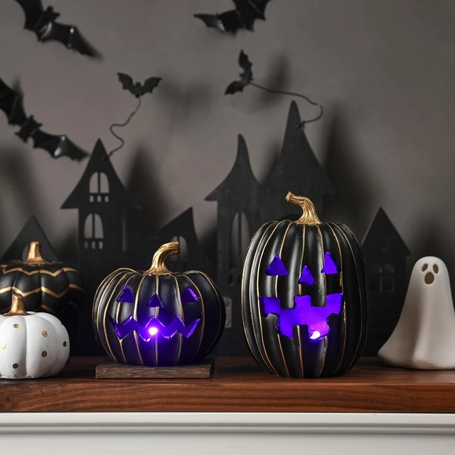 Alt view image 2 of 7 - Light Up Black Jack O Lantern Pumpkins for Indoor Halloween Decor | 2Pcs Resin Halloween Pumpkins with Gold Lines, Small LED Pumpkins with Purple Light for Spooky Table Decor (Battery Operated)
