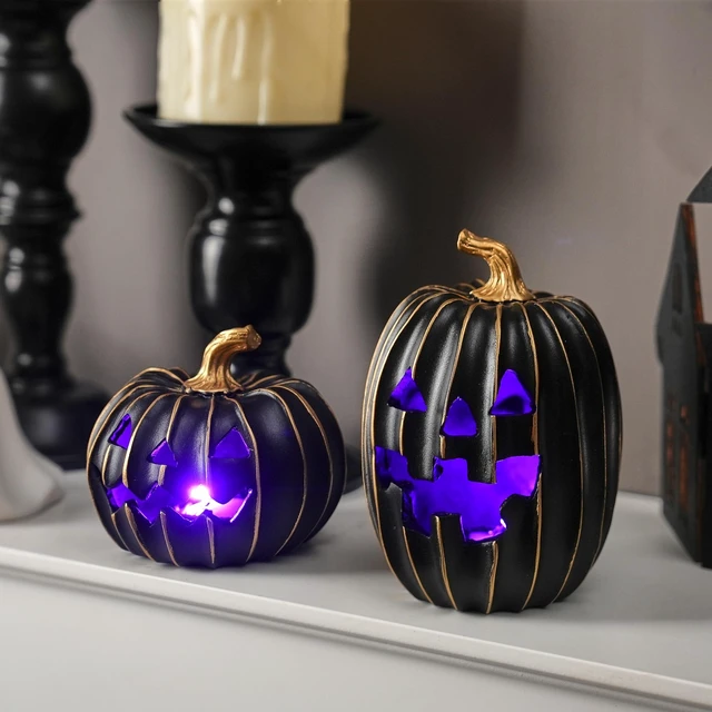 Alt view image 4 of 7 - Light Up Black Jack O Lantern Pumpkins for Indoor Halloween Decor | 2Pcs Resin Halloween Pumpkins with Gold Lines, Small LED Pumpkins with Purple Light for Spooky Table Decor (Battery Operated)