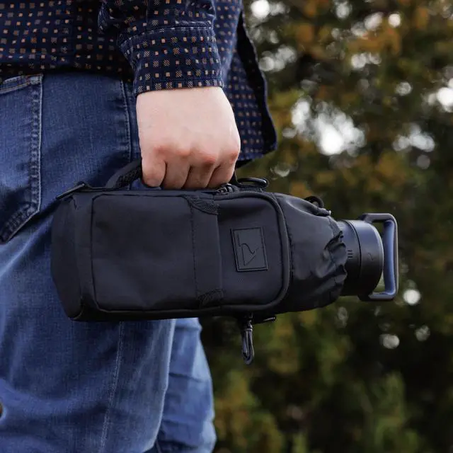 Alt view image 4 of 6 - Ozark Trail 32-40 fl oz Water Bottle Sling with Shoulder Strap and Front Zipper Pocket, Black