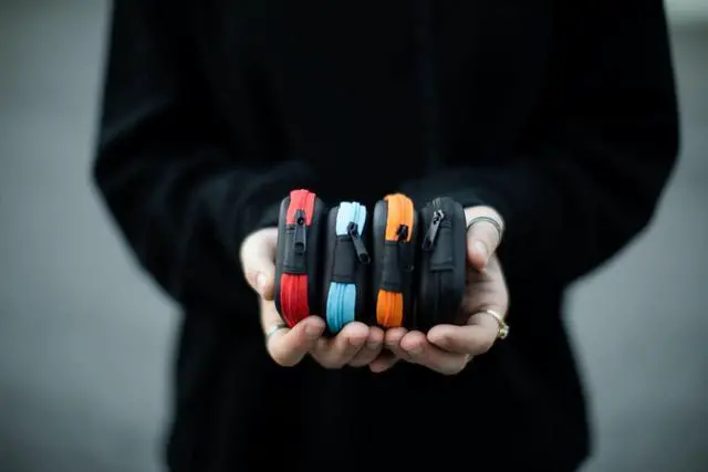 Alt view image 6 of 7 - Bulk 24 Pack Square Hard Foam Earbud Cases - Assorted Colors (Black, Blue, Red, Orange) Zippered EVA Travel Storage Pouches for Earbuds, Headphones, Small Tech & Jewelry