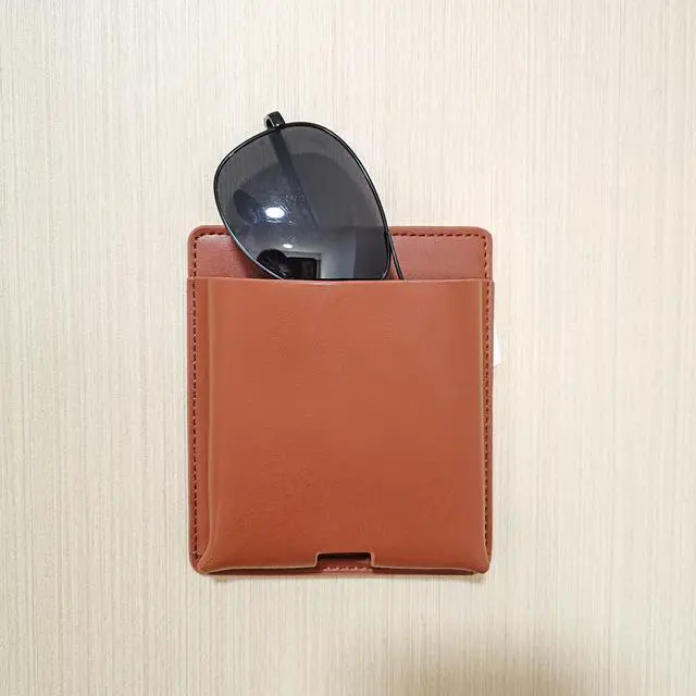 Alt view image 4 of 7 - 2 pcs Remote Control Holder, Wall Mounted Self-adhesive Leather Hanging Pouch Waterproof Wall Hanging Pouch for Cell Phone Remote Control Office Home School (Brown)