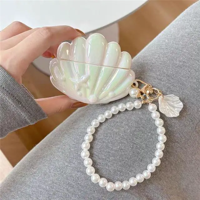 Alt view image 2 of 6 - Case for AirPods 2nd/1st Generation with Pearl Wrist Chain,Beautiful Creative Glitter 3D Headphone Protective Shell for Air Pod 1 & 2 Cover for Girls Women (Seashell)