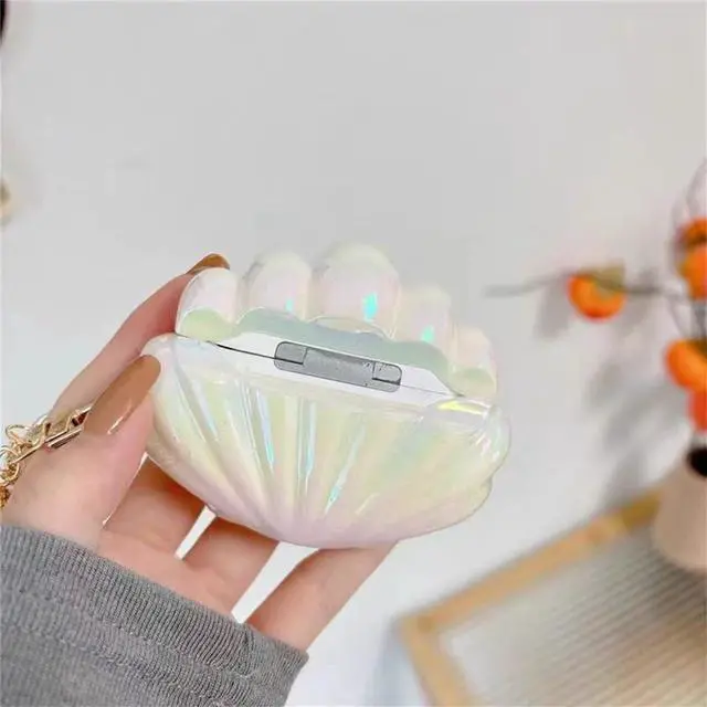Alt view image 4 of 6 - Case for AirPods 2nd/1st Generation with Pearl Wrist Chain,Beautiful Creative Glitter 3D Headphone Protective Shell for Air Pod 1 & 2 Cover for Girls Women (Seashell)