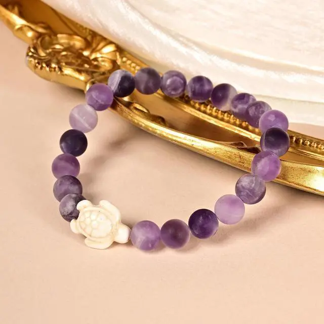 Alt view image 5 of 7 - Sea Turtle Tracking Bracelet Amethyst, helps save sea turtles, one size fits most Men and Women