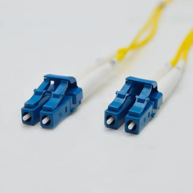 Main image of 12Pk 2M OS2 LC LC Single Mode Fiber Optic Cables - 12 Pack | Duplex 9/125 LC to LC Singlemode Jumper Cord 2 Meter (6.56ft) | Pack Options: 2, 4, 6, 10, 12, 24 | PVC Optic-Cord lc-lc