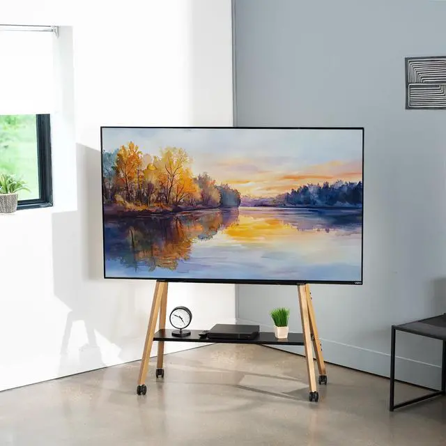 Alt view image 2 of 6 - Rolling Artistic 43 to 75 inch LED LCD Screen Mobile Studio TV Easel Stand, Wood Accessory Shelf, Adjustable TV Mount with 4 Walnut Legs, Black Frame, STAND-TV75R