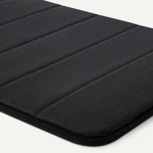 Alt view image 4 of 5 - Amazon Basics Absorbent & Fast Dry Plush Memory Foam Bath Mat, 17 x 24 in, Black