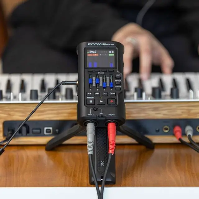 Alt view image 2 of 7 - Zoom R4 MultiTrak 32-Bit Float Recorder with 128GB Ultra UHS-I microSDXC Memory Card and Pistol Grip Tabletop Tripod