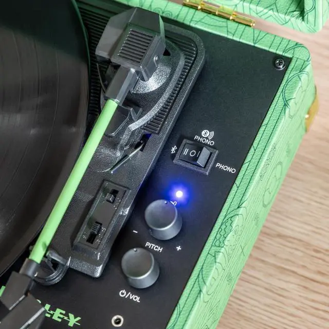 Alt view image 5 of 7 - CR8005F-EW Wicked Elphaba Cruiser Record Player, Emerald Green | 3-Speed Turntable, Bluetooth In / Out, Built-in Stereo Speakers, Isolated Internal Speakers Minimize Vibration