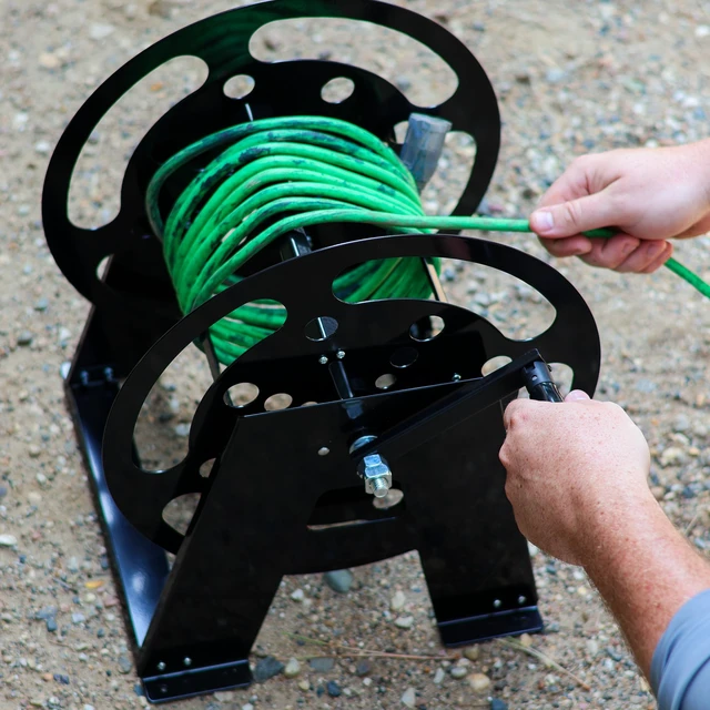 Alt view image 4 of 7 - RV Extension Cord Reel Stand - 50-100ft Black Steel RV Electrical Cord Roll Up or Camper Hose Organizer Spool