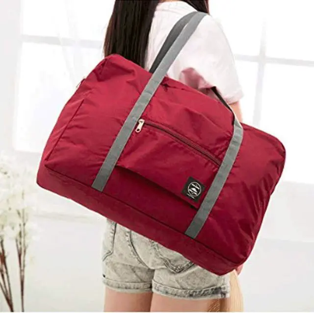 Alt view image 6 of 7 - 2 Pack Foldable Travel Bag Waterproof Travel Duffel Bag,Women Ladies Man Canvas Weekender Bag Overnight Carry-on Tote Duffel in Trolley Handle (Black&Rred)
