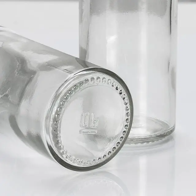 Alt view image 3 of 7 - Tianifa 2 Pcs Glass Spice Jars/Bottles - 3oz Empty Round Spice Containers with Airtight Metal Caps with Shaker Lids (2, clear)