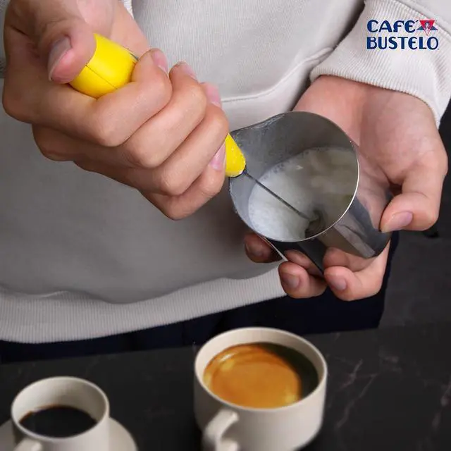 Alt view image 2 of 7 - Café Bustelo Electric Coffee Milk Frother Handheld Battery-Operated Drink Mixer with Stainless Steel Whisk & Stand, Bold Yellow Design, Perfect for Lattes, Cappuccinos & Café-Style Coffee Drinks