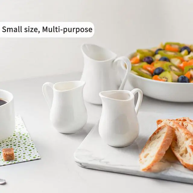 Alt view image 6 of 7 - Gurygo 2 Pack 4 Oz Classic White Ceramic Small Creamer Pitcher with Handle- Fine Porcelain Small Milk Pitcher - Ceramic Creamer Container for Coffee Milk Sauces Salad, Microwave & Freezer Safe