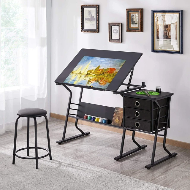 Main image of Tilting Drafting Table Art Craft Desk with Stool, Drawers, Black | Steel frame and MDF top adjusts 0-40° for drawing or diamond painting; 3 drawers and shelf organize supplies in small spaces.