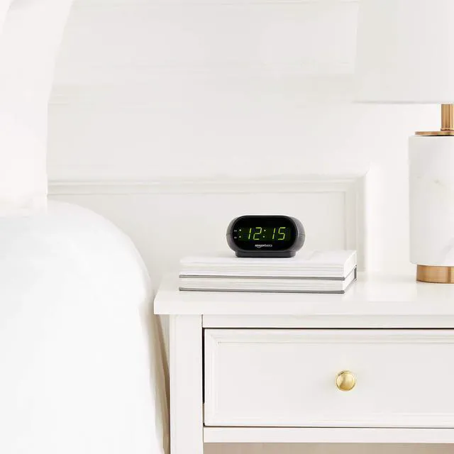 Alt view image 6 of 7 - Amazon Basics Small Digital Oval Alarm Clock with LED Display, Nightlight, Snooze Function, Battery Backup, Black, 4.5 x 3.5 x 2.4 Inches