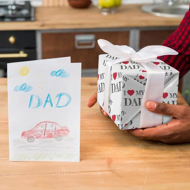 Alt view image 6 of 7 - SaringSwoon Father's Day Wrapping Paper for Men Dad Grandfather - White Gift Wrap With I Love My Dad and Heart Design for Father's Day Birthdays - 28×40 Inches, 4 Folded Jumbo Sheets