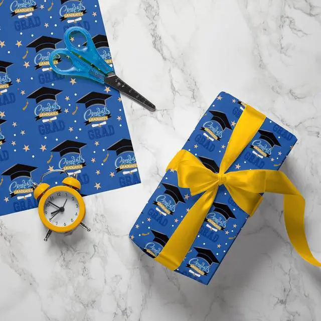 Alt view image 4 of 6 - ZINTBIAL 2026 Graduation Wrapping Paper - Blue and Gold Gift Wrapping Paper With Black Mortarboard Caps,Congratulations Design Perfect for Graduation Party Celebration - 20 x 29 Inch, 6 Folded Sheets