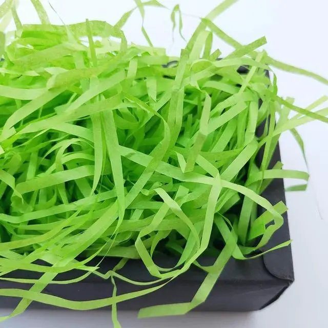 Alt view image 6 of 7 - Hikkcos 1/2 LB Easter Green Grass Large Pack Green Raffia Grass Recyclable Shred Paper for Gift Basket Filler Easter Party Decoration Wrapping Basket Filling