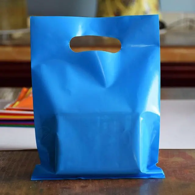 Alt view image 6 of 7 - Plastic Party Favor Small Gift Bags, 100 PCS 6" x 8" Goodie Bags for Kids, Candy Treat Pouches Bulk with Handle for Kids' Birthday Party, Thanksgiving, Christmas, Halloween, 10 Colors