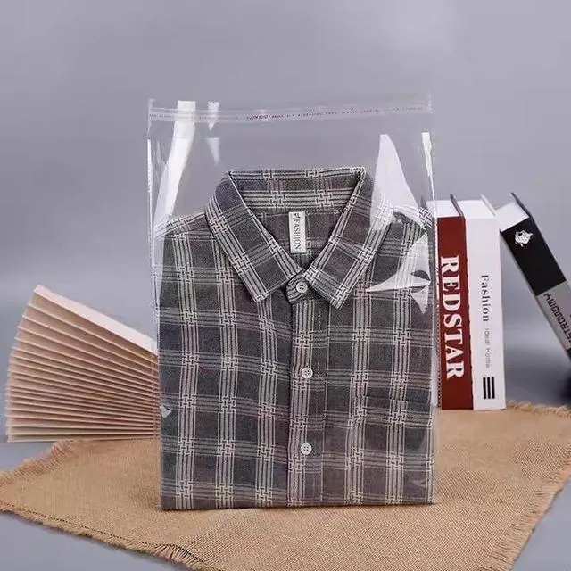 Alt view image 3 of 7 - 100 Pieces (9x12 Inch) Clear Plastic Bags for Packaging, Clothing & T-Shirts Strong Packing Self Adhesive Cellophane Bag