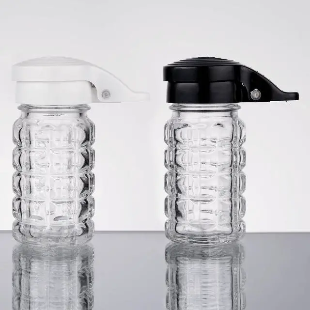 Alt view image 3 of 6 - Tablecraft Moisture Proof Salt & Pepper Shakers - 1.5 Oz - Glass w/Black & White Lids Spring Loaded, No Clog, Set of 2
