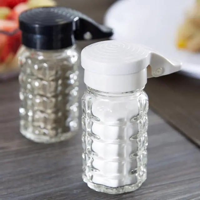 Alt view image 2 of 6 - Tablecraft Moisture Proof Salt & Pepper Shakers - 1.5 Oz - Glass w/Black & White Lids Spring Loaded, No Clog, Set of 2