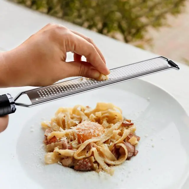 Alt view image 4 of 6 - Lemon Zester and Cheese Grater with Secure-Grip Handle - Stainless Steel, 15x1.4 inches