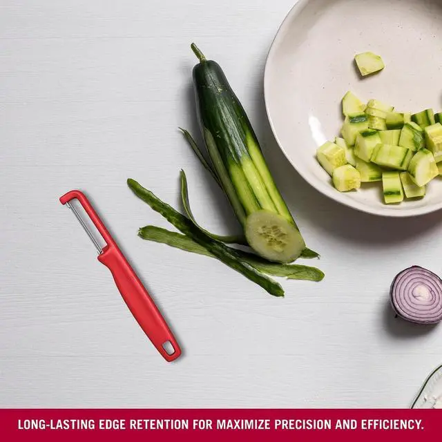 Alt view image 4 of 6 - Victorinox Iota Peeler for Vegetables Fruits, Serrated Edge,Swiss Made, Red