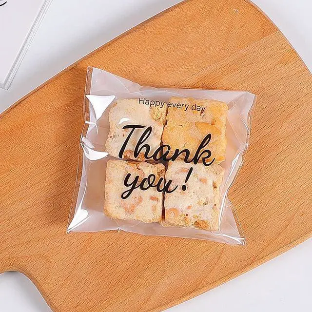 Alt view image 3 of 6 - 100 Pcs Self Adhesive Cookie Bags, with Thank You sign,Searik White Polka Dot Plastic Pastry Bags for Giving Bakery Candy Cookie Chocolate (4 x 4 Inches, 100 Pcs)