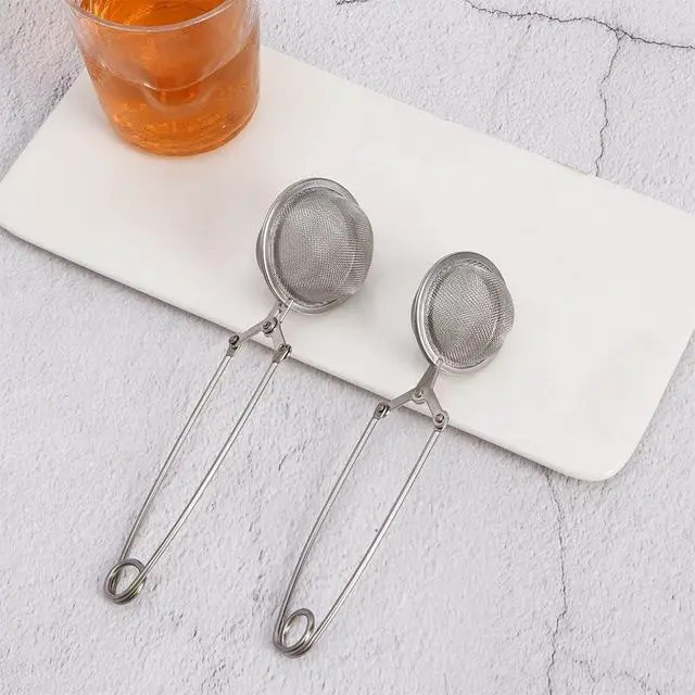 Alt view image 6 of 7 - Silver Snap Ball Tea Strainer with Handle,Tea Strainer Ball Stainless Steel Tea Infuser Filter for Loose Leaf Tea Spices Seasonings Kitchen and Dining (Large)