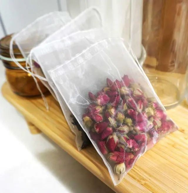 Alt view image 5 of 7 - 50Pcs Empty Pyramid Nylon Tea Bags Mesh Tea Infuser Bag Herb Spice Filter Strainer Bags With String (3.93x4.7inch)
