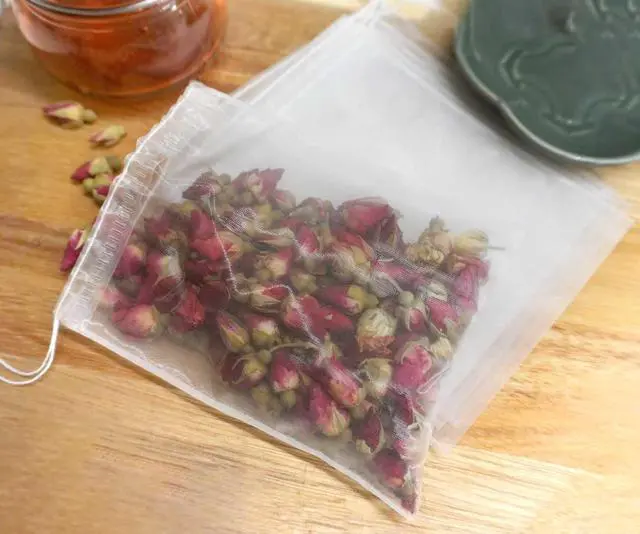 Alt view image 7 of 7 - 50Pcs Empty Pyramid Nylon Tea Bags Mesh Tea Infuser Bag Herb Spice Filter Strainer Bags With String (3.93x4.7inch)