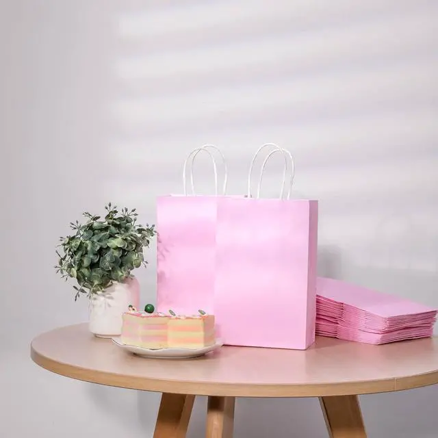 Alt view image 2 of 7 - SUNCOLOR 12-Pack Pink Gift Bags with Handles, 7.9x5.12x3.15 Inches Kraft Paper Party Favor Bags for Baby Showers, Birthdays, Weddings