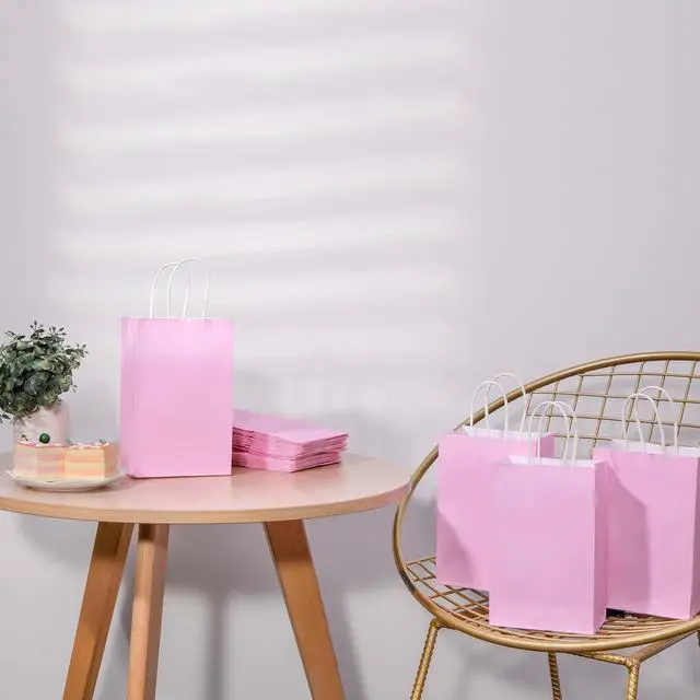 Alt view image 5 of 7 - SUNCOLOR 12-Pack Pink Gift Bags with Handles, 7.9x5.12x3.15 Inches Kraft Paper Party Favor Bags for Baby Showers, Birthdays, Weddings