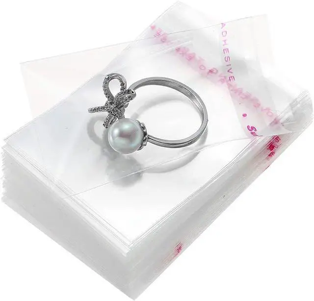 Main image of 200 Pcs 1.5" x 1.5" Thick Small Clear Resealable Cello Seal Cellophane Bags Self Adhesive Packing Jewelry Bead Necklace Ring Poly Cellophane Bag