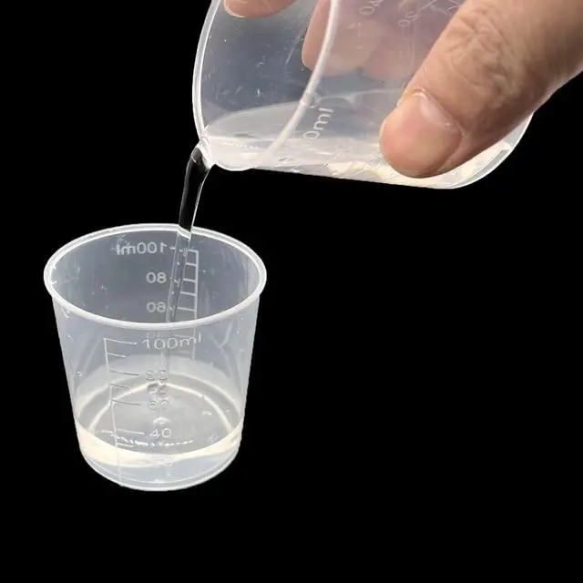 Alt view image 3 of 5 - 24 Pcs Clear Scale Cups, Plastic Graduated Cups 3.4oz. | Transparent Experiment Measuring Cup 100ml with 50 Pcs Wooden Stirring Sticks for Epoxy, Resin, Stain, Mixing Paint