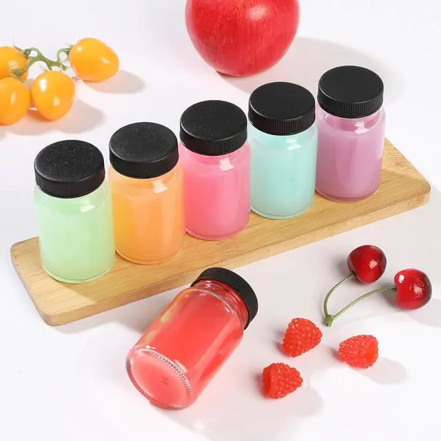 Alt view image 5 of 7 - 2 oz Glass Shot Bottles Black Lids & 24 Labels And Brush-Small Clear Jar for Ginger,Juice, Sample, Whiskey-Travel Essentials Mini Bottles-Wide Mouth, Leakproof,Wellness Shot,Dishwasher Safe (9)