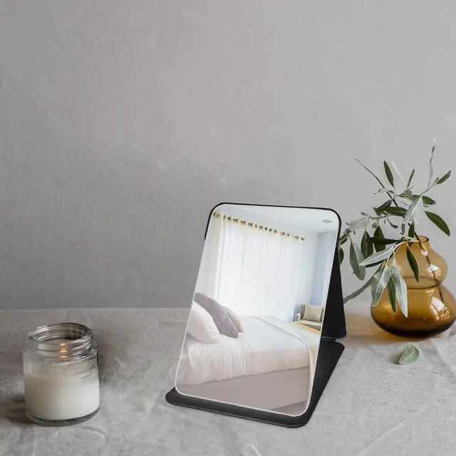 Alt view image 5 of 7 - Makeup Mirror, 6x8 Inches Portable PU Leather Mirror, Folding Desktop Vanity Mirror with Adjustable Stand for Vanity Table, Office, Travel (M, Black)