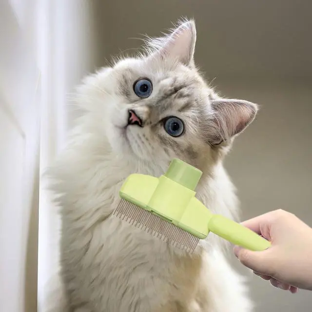 Alt view image 6 of 7 - Dogs and Cats Comb with Release Button, Pet Hair Removal Tools with Safe Stainless Steel Teeth for Deshedding, Cat Grooming Supplies for Long/Short Hair, Cat Brush for Shedding, Green