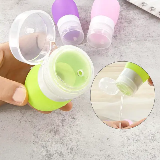 Alt view image 2 of 7 - Mziart Travel Bottles for Toiletries, TSA Approved 2oz Silicone Travel Size Containers, 3 Pack Leak-Proof Squeezable Refillable Shampoo and Conditioner Bottles (Pink, Purple, Green)