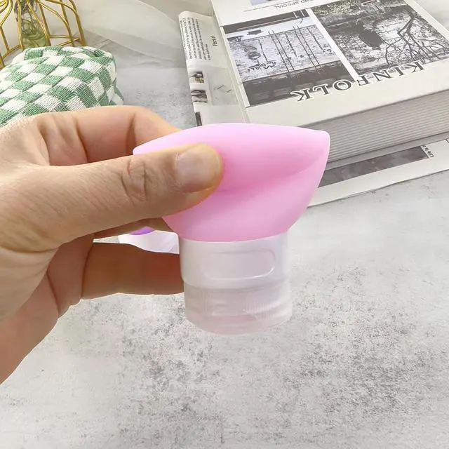Alt view image 7 of 7 - Mziart Travel Bottles for Toiletries, TSA Approved 2oz Silicone Travel Size Containers, 3 Pack Leak-Proof Squeezable Refillable Shampoo and Conditioner Bottles (Pink, Purple, Green)