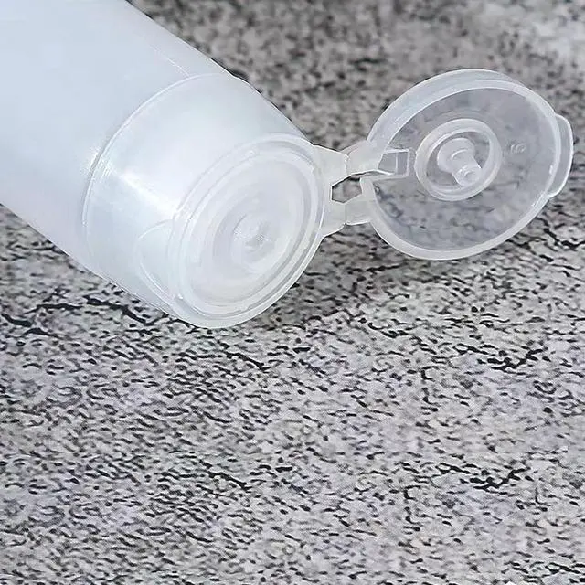 Alt view image 3 of 6 - GANPUB 5 Pcs White 1 oz Travel Bottles Empty Refillable Toothpaste Tubes Containers Small Mini Size Squeeze Dispensers, Refillable Containers Pump Dispensers Refillable Cosmetic(10 * 2.7cm)