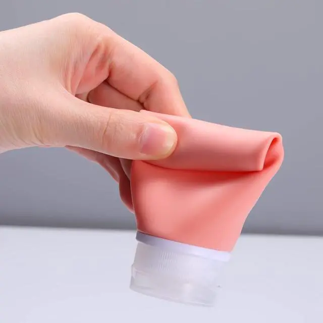 Alt view image 3 of 7 - Leak Proof Silicone Travel Bottles,4 Pack 2oz Liquid Squeezable Refillable Portable Travel Accessories/Cosmetic Containers,BPA Free,Travel Size Bottles for Toiletries Shampoo Conditioner Lotion