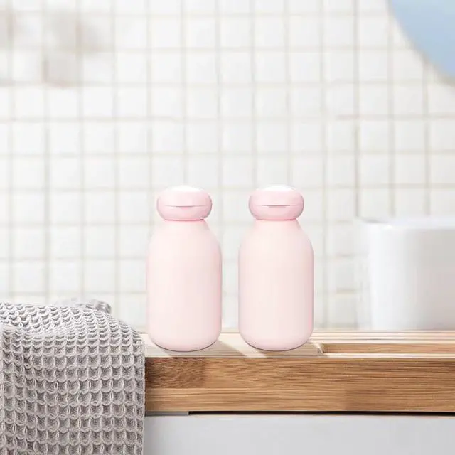 Alt view image 6 of 7 - Squeeze Bottle with Flip Cap 3.4 oz Travel Bottles for Toiletries | 2 Pack 100ml TSA Approved, Leak Proof, Shampoo and Conditioner Bottles, Refillable Plastic Travel Size Bottles, Pink